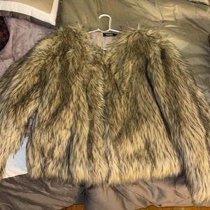 Fur coat perfect for classy, casual However needs to be used